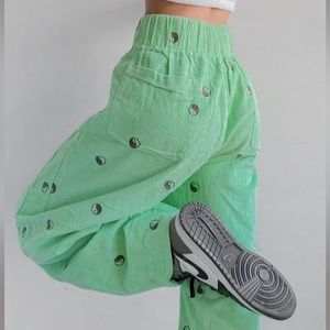 Urban Outfitters parachute peace sign pants